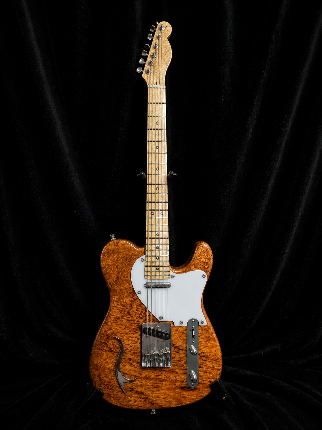 Handcrafted miniature Fender Telecaster in Texas mesquite with maple neck and headstock, white pickguard, brass accent and sterling hardware by Rob Gwynne
