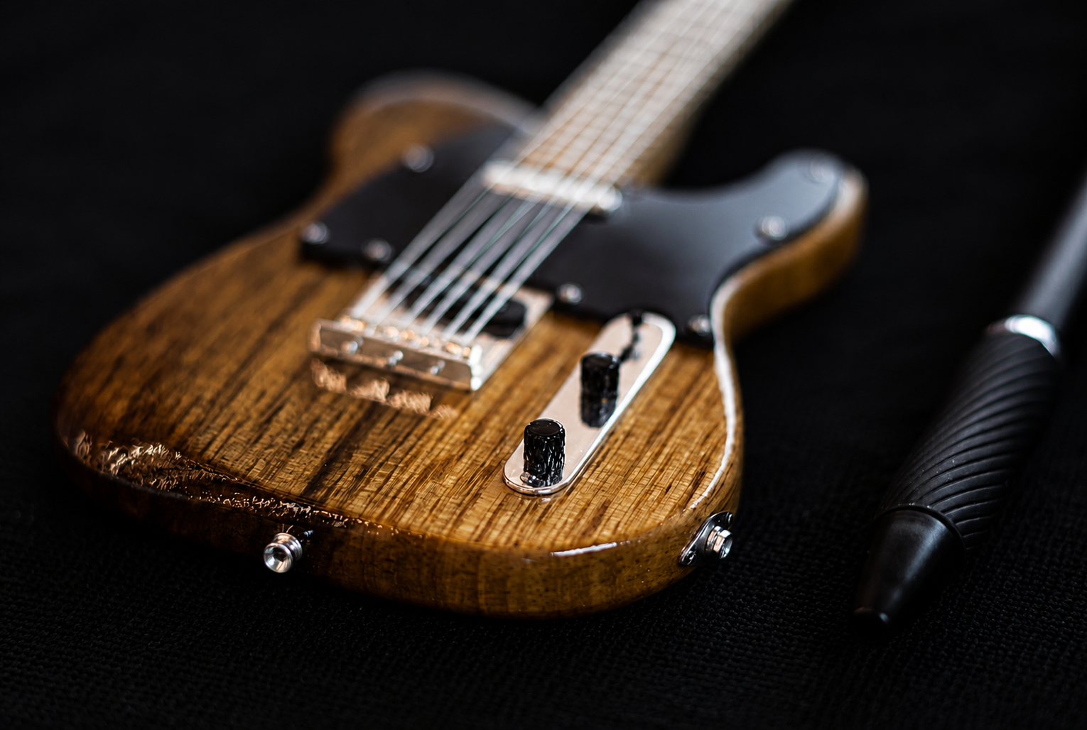 Detail of the miniature Telecaster bridge, saddles and control plate