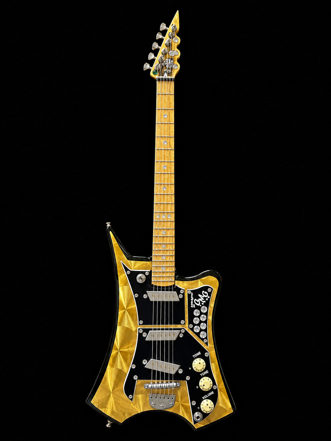 Handcrafted one-of-one GMG Signature electric guitar featuring gold foil, a black plastic pickguard, and silver hardware with semi-precious gem inlays by Rob Gwynne