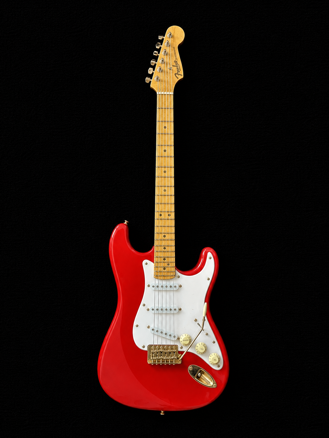 Handcrafted miniature Squier Classic Vibe '50s Stratocaster replica in fiesta red with white pickguard and solid 14K gold hardware by Rob Gwynne