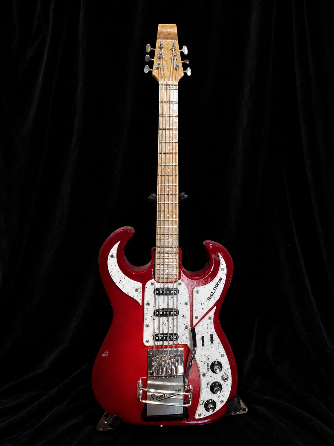 Handcrafted miniature Baldwin Bison in cherry red burst with a pearl-fleck scratchplate and sterling hardware by Rob Gwynne