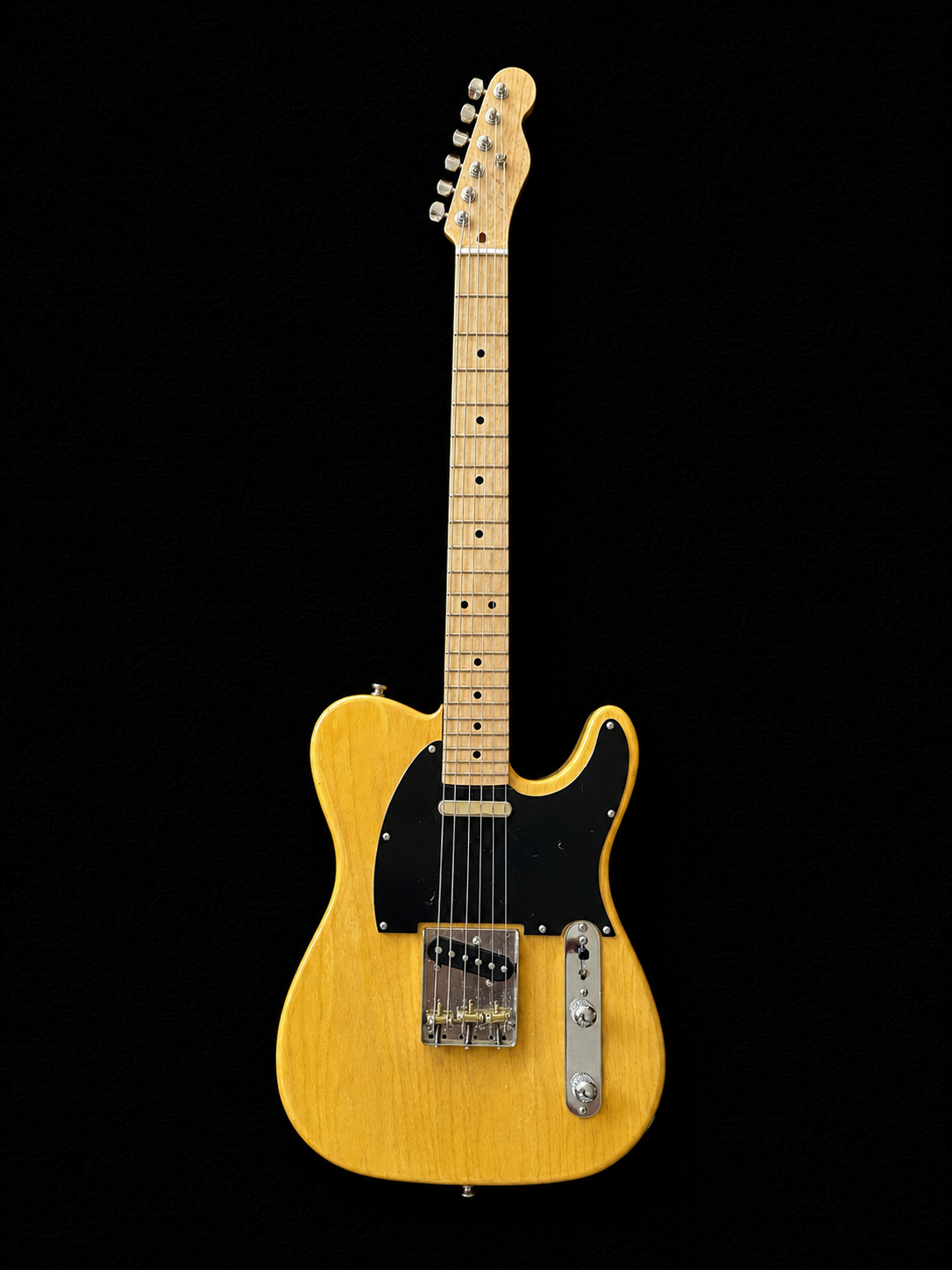 Handcrafted miniature Fender Telecaster in butterscotch blonde with black bakelite pickguard and 14K white and yellow gold hardware by Rob Gwynne